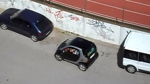 terrible parking job smart car