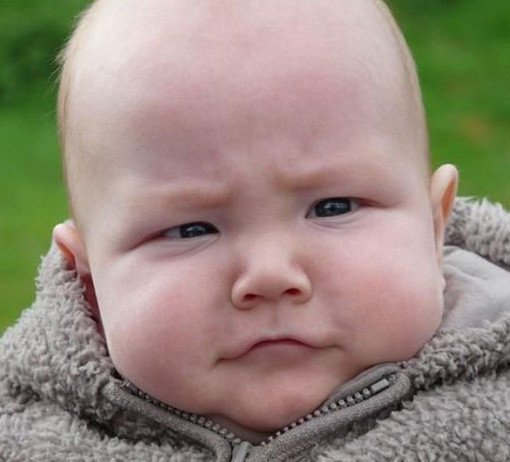 funny baby face puzzled kid