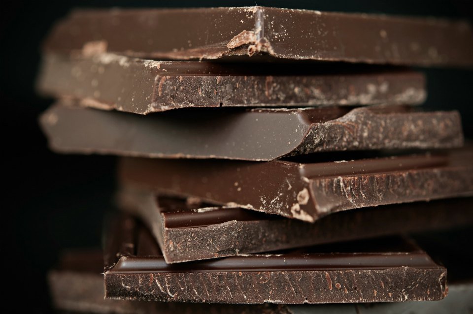 A-close-up-of-a-stack-of-dark-chocolate