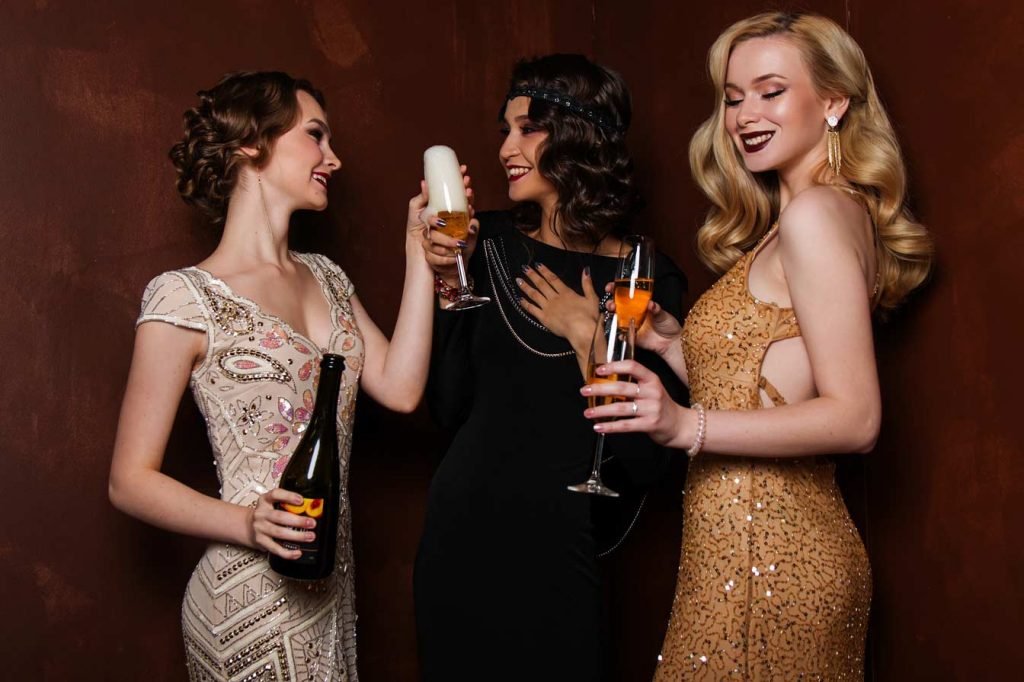 bachelorette party ideas three girls celebrate drinking champagne